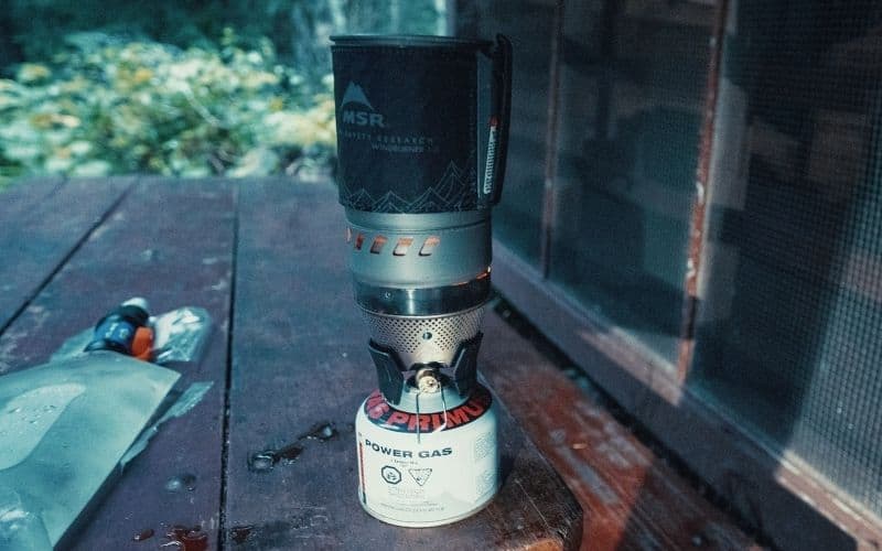 MSR Windburner stove on wooden table