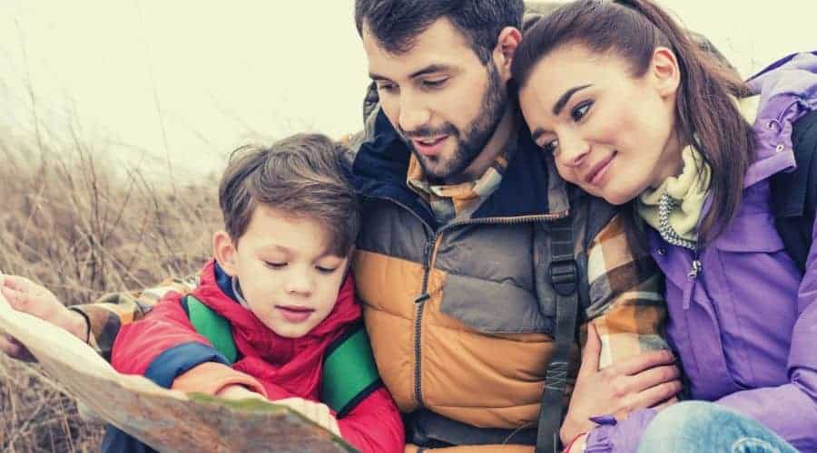 Kid helps parents pick hiking route