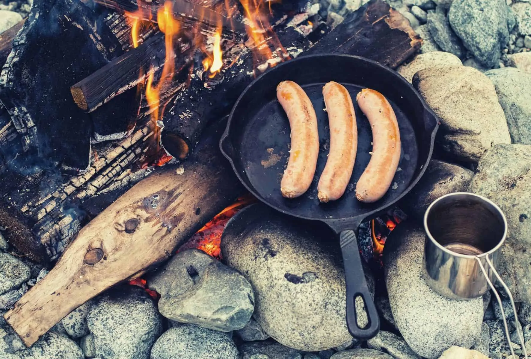camp cooking with cast iron featimage