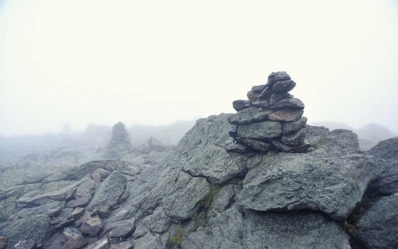 Rock cairns in the fog