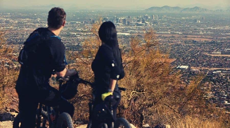 two cyclists view of Phoenix on the holbert trail intext