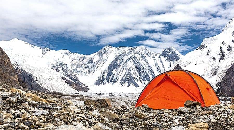 tent on cold mountain scree - In Text