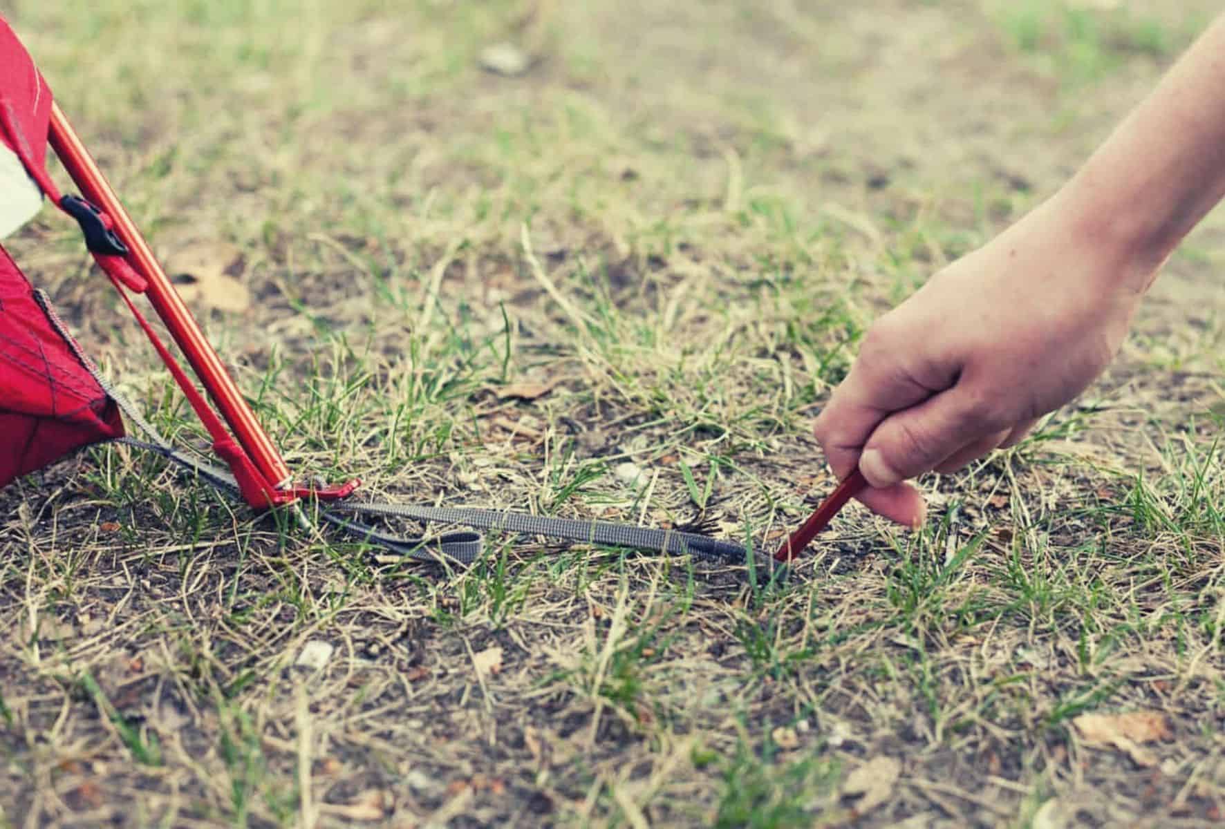 how pitch tent stakes anywhere featimage