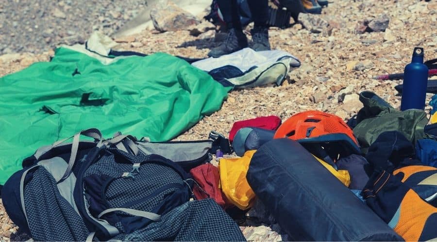 backpacking gear on mountainside closeup