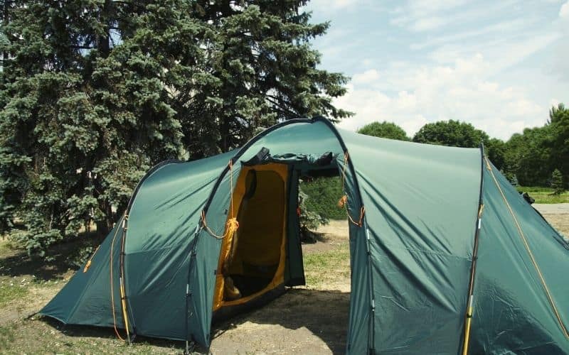 Tunnel tent pitched in a field