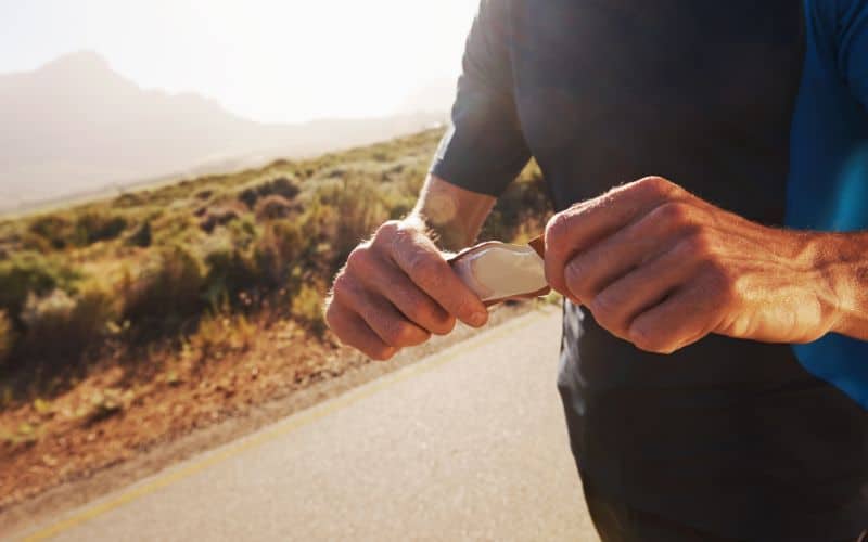 Hiker taking an energy gel