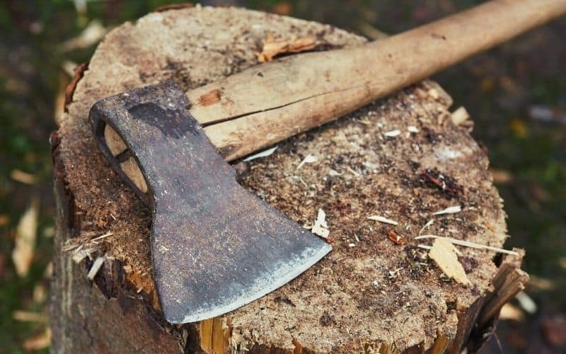 Axe showing a crack in the wooden handle