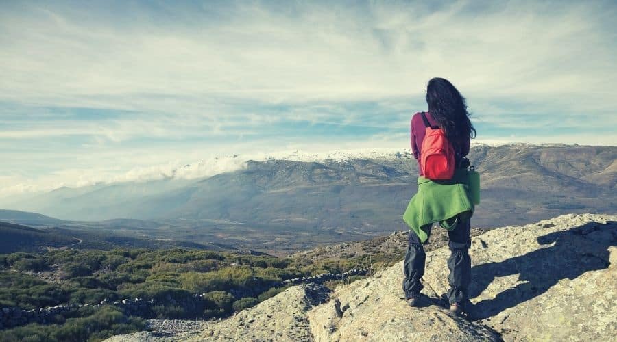 hiker with knee length gaiters