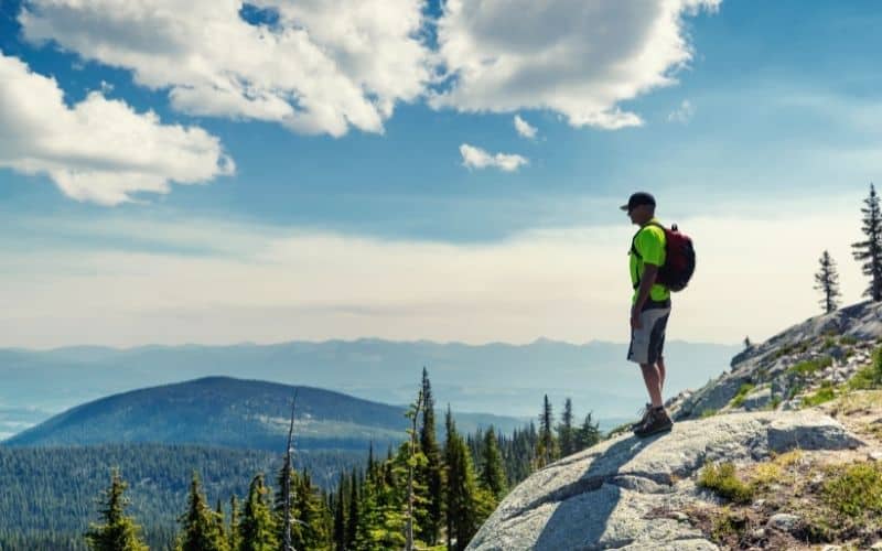 Hiker wearing a brimmed hat