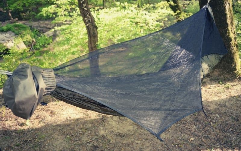 hammock bug net over hammock in forest