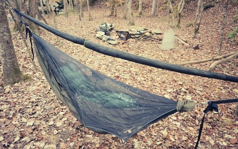 hammock camping with bug net below ridgeline