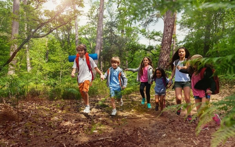 Kids hiking with friends