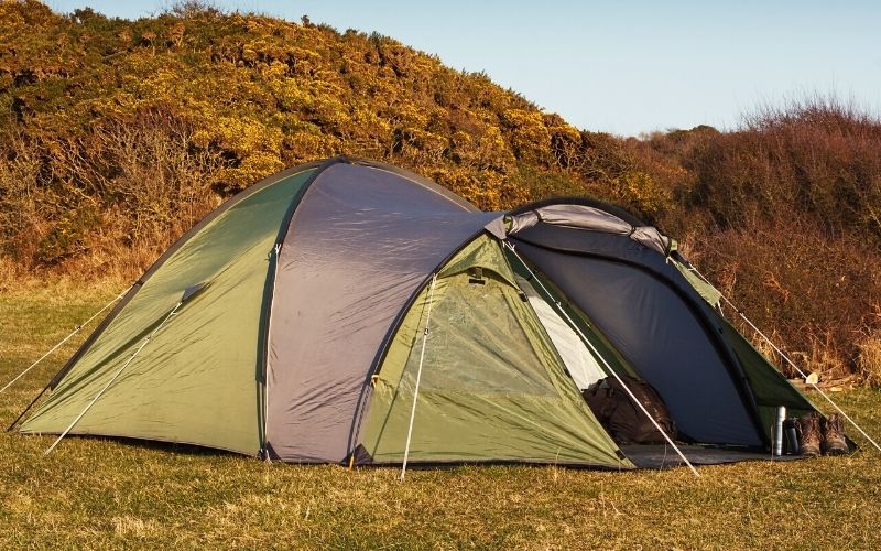 Large dome tent pitched in field