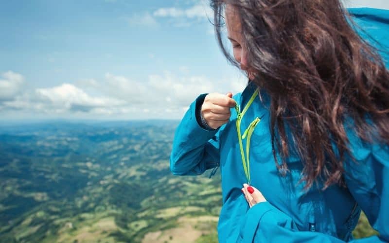 Hiker wearing thinner jacket