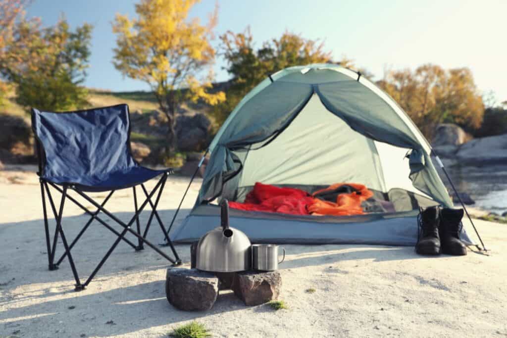 Camping chair in front of tent