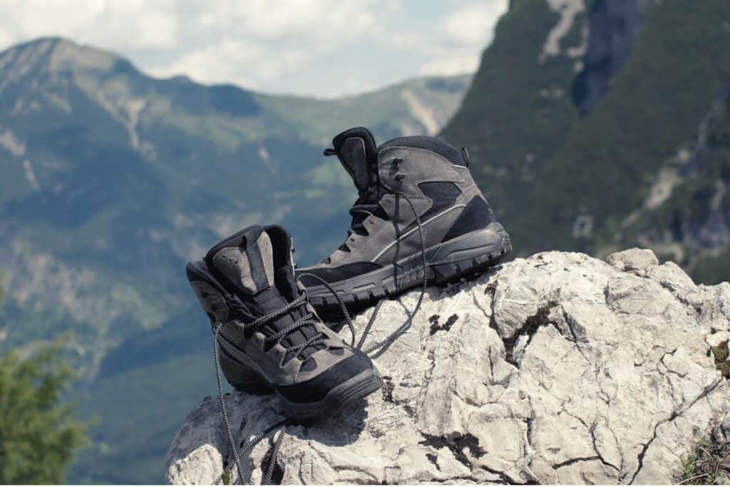 Hiking boots sitting on a rock