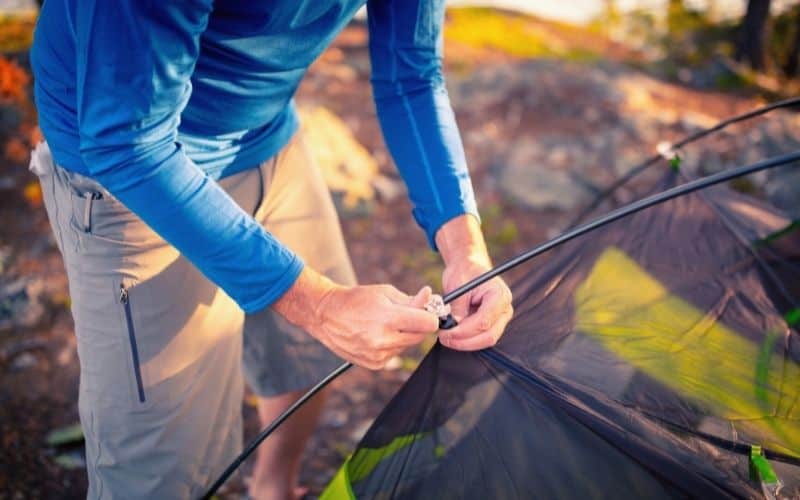 Inner tent being clipped onto poles