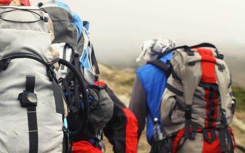 Close up of hikers backpacks