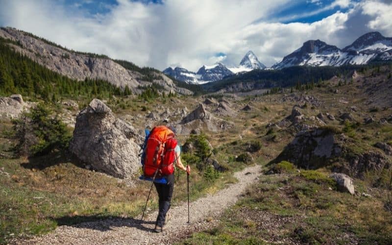 backpacker walking along trail near Banff Canada