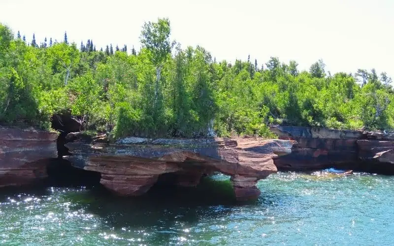 Cliffs topped with trees overlooking Lake Superior shoreline, Wisconsin