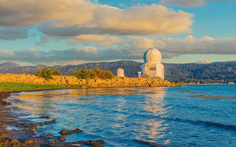 Looking over Big Bear Lake with the solar observatory in the foreground and mountains in the distance