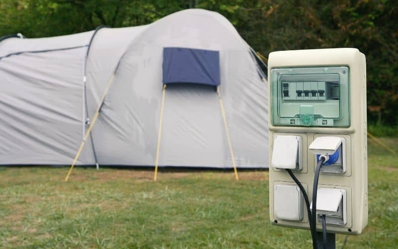 Electrical hookup point in front of a tent