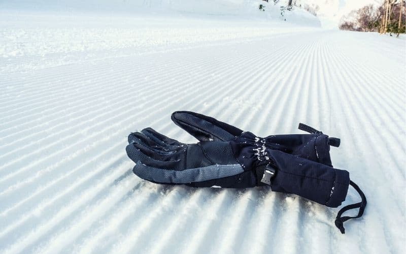Hiking glove lying in the snow