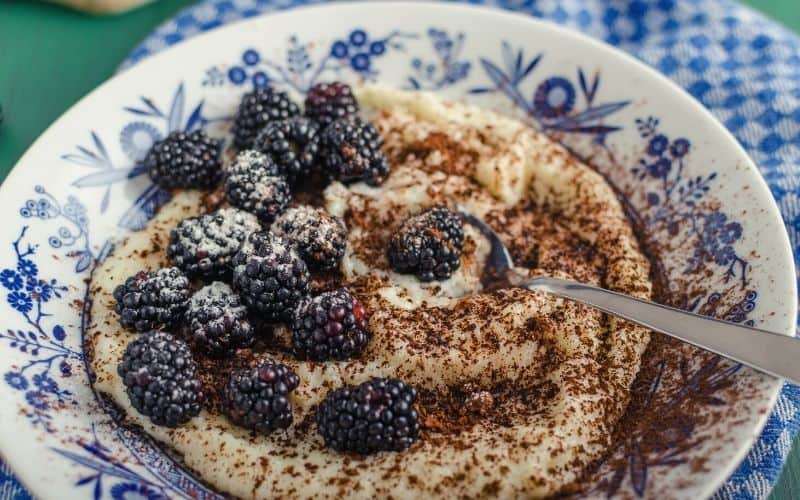 Bowl of porridge with blackberries