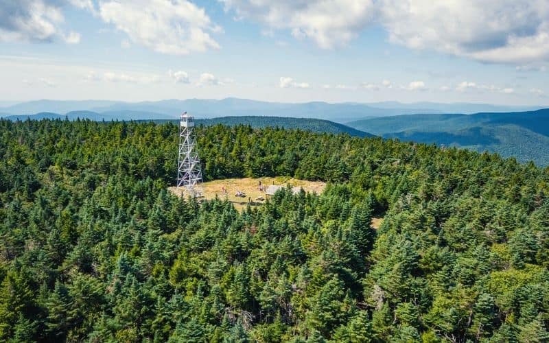 Aerial view of Hunter Mountain Fire Tower and the surrounding forest