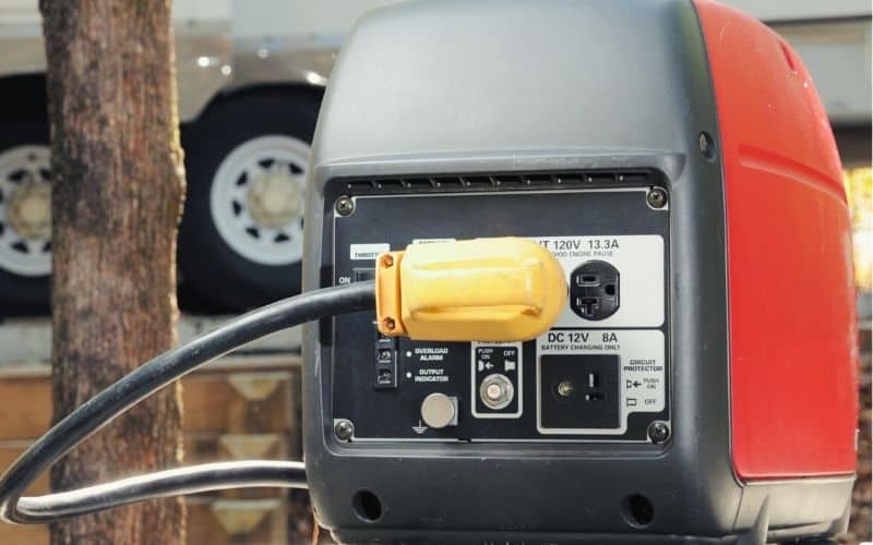 Close up of portable generator showing multiple outlets