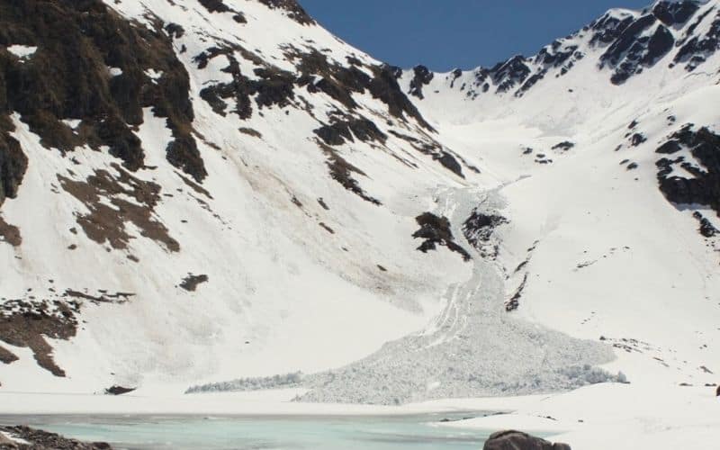 Snowy mountain showing recent small avalanche