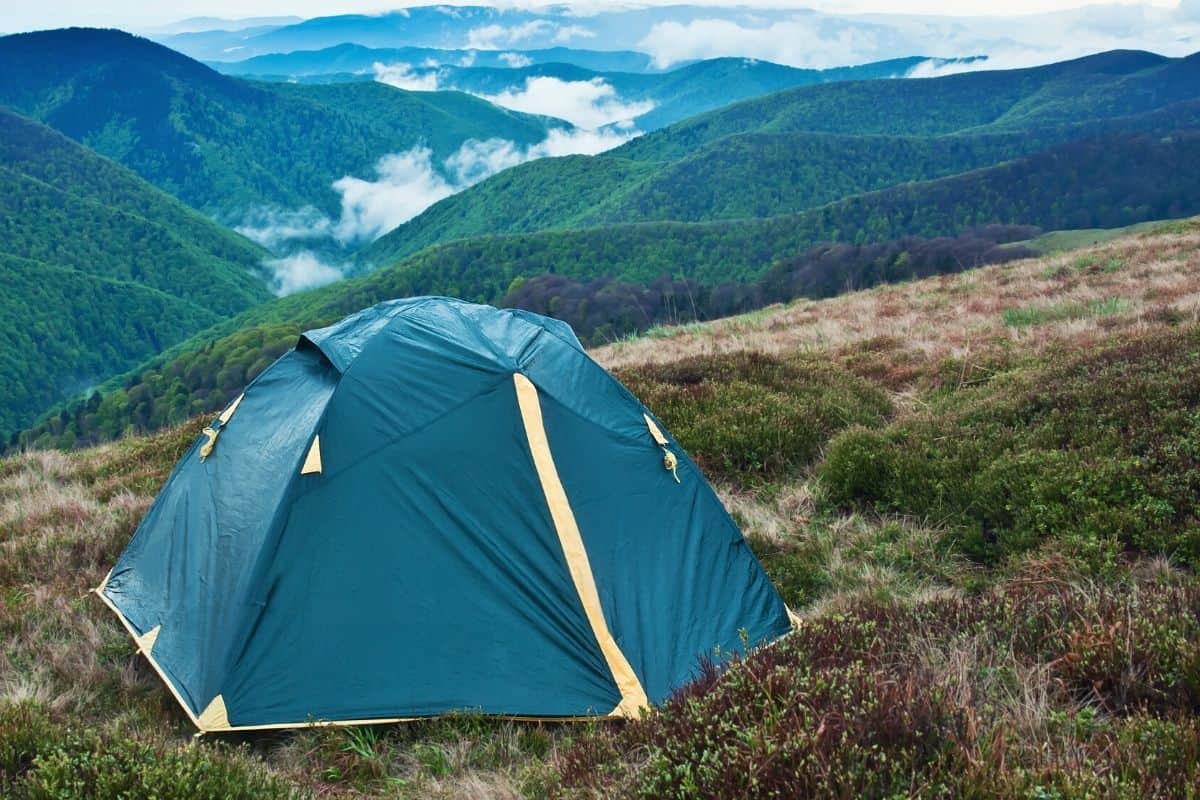 Wet tent on a mountainside