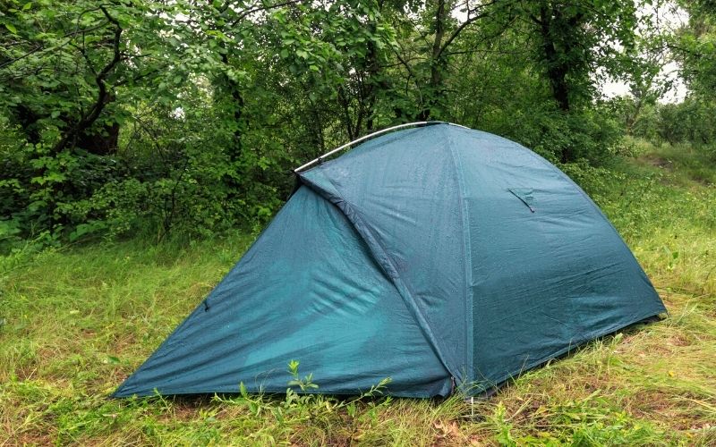 Tent fabric soaked through in rain