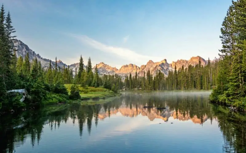 Sawtooth mountains reflection over a lake