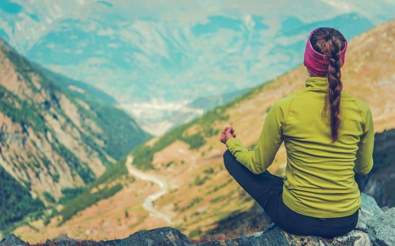 hiker doing yoga