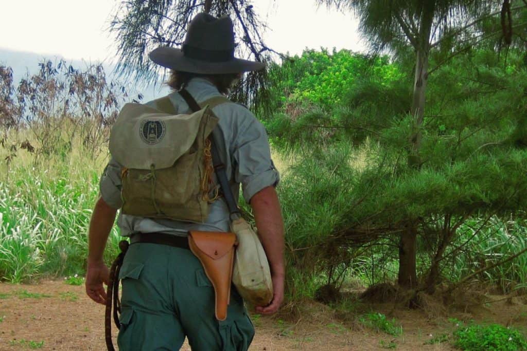 Ranger wearing a hat, backpack and utility belt