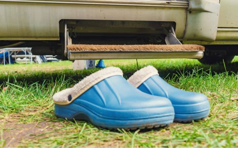 Croc slippers sitting outside caravan