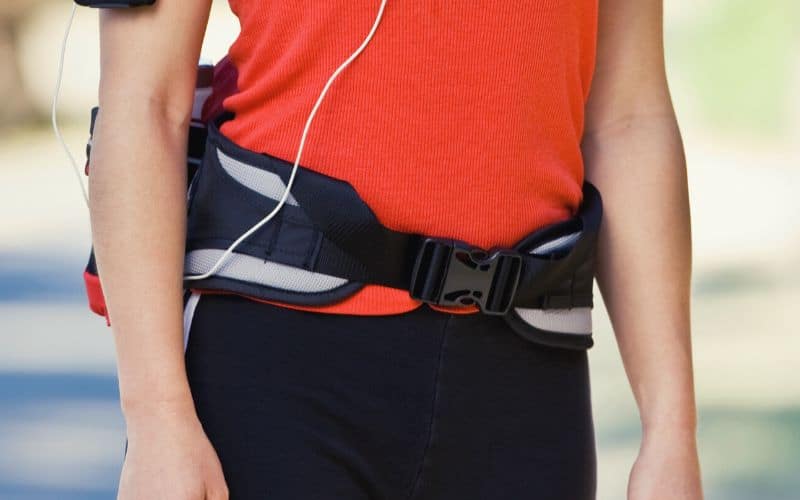 Fanny pack with padded waist band fastened at the front