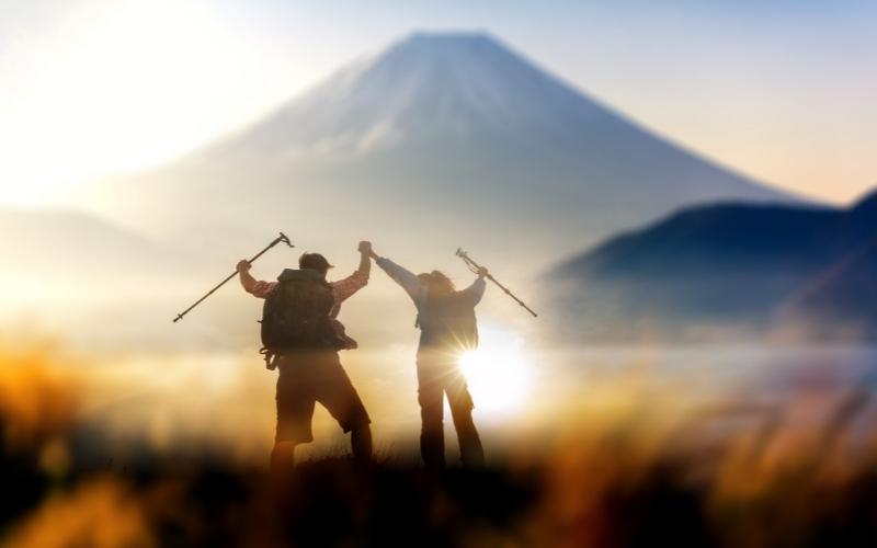 hikers with trekking poles