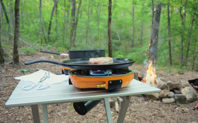 Cast iron skillet on a camp stove