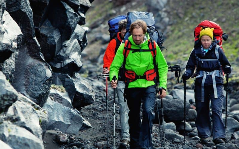 Group of hikers using trekking poles