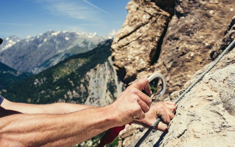 climber clipped into cables