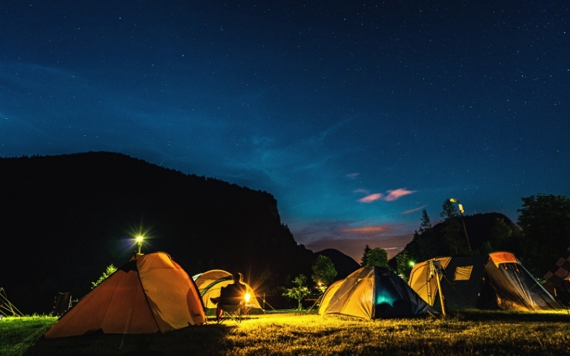 camping tents under the sky at night