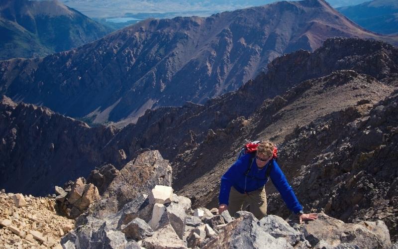 hiker scambling