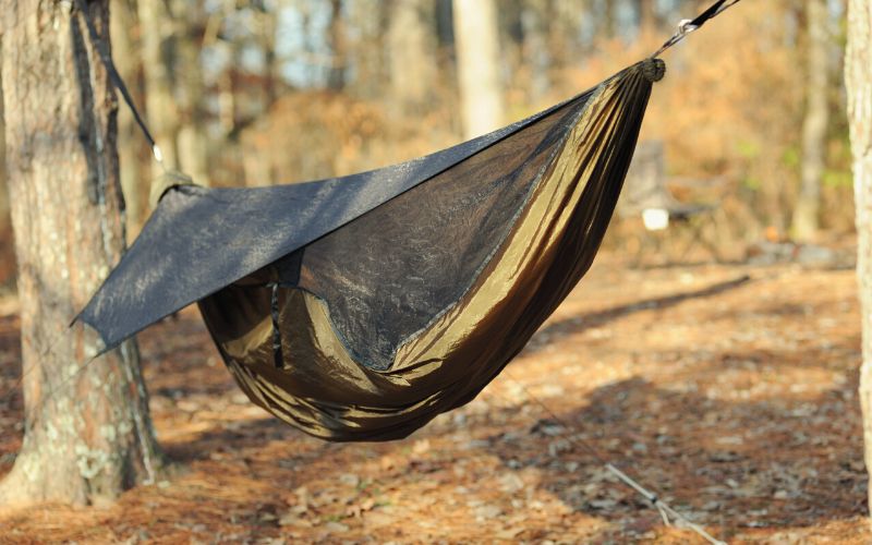 Tarp stretched out over a hammock
