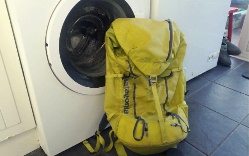 Backpack in front of washing machine