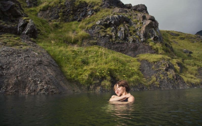 Couple swimming in lake