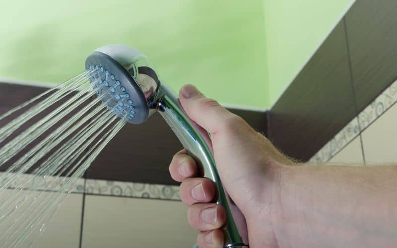 Holding a shower head