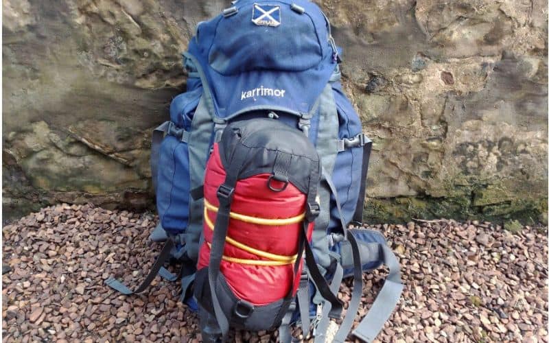 Sleeping bag attached to rucksack with bungee cord