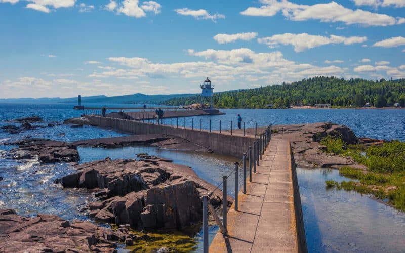Grand Marais Lighthouse in front of the Sawtooth Mountains on Lake Superior, Minnesota.